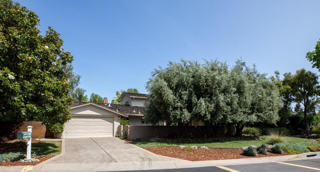 First time on market. Welcome to this timeless and spacious Los Altos two-story residence. A classic, move-in ready home just minutes from Downtown Los Altos, the LA Golf & Country Club, and Rancho San Antonio Park. Set on a beautifully landscaped ~10,767 sq ft lot, this ~2,839 sq ft home features 5 bedrooms and 2.5 bathrooms, ideal for growing or multi-generational families. Filled with natural light and graceful character, it has been lovingly maintained. The layout includes a formal living room, stylish dining room, and inviting family room, all overlooking the lush, private backyard. The bright kitchen with breakfast nook and adjacent laundry room provide ample storage and practical space for daily living. Three BR and a full bath are located upstairs, with 1.5 baths and two additional BR on the main level, perfect for guests or home office use. A bonus room off the garage offers a great space for a gym or creative studio. Enjoy the tranquil backyard retreat, framed by mature landscaping, ideal for entertaining or unwinding in nature. Top-rated Montclaire Elementary, Cupertino MS, and Homestead HS. Close to parks, trails, and shopping, this home offers the ideal blend of suburban peace and modern convenience. Don't miss your chance to own this rare Los Altos treasure!