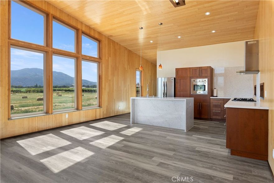 RECENTLY UPDATED! Featuring beautiful new quartz countertops, and quartz waterfall kitchen island, stainless steel appliances. Plus, freshly painted interiors, new flooring. New vanity. & LED mirrors. 

10+ acre horse and homestead property offers exceptional income potential and numerous features. The main home boasts 2 bedrooms and 1 bathrooms, complemented by a detached 1 bedroom 1 bath studio. It is equipped with solar panels and has the potential to become an off-grid solar-powered residence. Additional amenities include a saloon, barn for hay storage two horse paddocks, a well, and hydronic floor heating. 

The property is strategically located on Soda Bay Rd, close to Lakeport Proper and county park. It's situated in the Big Valley AVA of Lake County, offering possibilities for agricultural use such as hay production or even a vineyard. The parcel is zoned APZ (Agricultural Preserve Zoning) and benefits from tax savings under the Williamson Act.

Constructed with structurally engineered panels (SIPS), the home is highly energy-efficient with R30 walls and R52 ceilings. It features a standing seam metal roof, metal siding, and a modern design. The water is provided by a windmill, and the property is built above the floodplain, eliminating the need for flood insurance.

The property includes fruit trees and unique design elements such as bamboo ceilings and walls with clay finishes.



SELLER FINANCING AVAILABLE