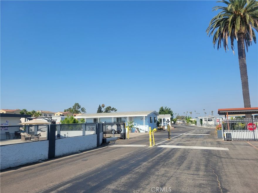 Located in a quiet senior mobile home park, this well-maintained 2003 unit offers 2 spacious master bedrooms and 2 Bathrooms. The kitchen and family room feature a skylight, filling the home with natural light. Enjoy the open and roomy layout, along with an outside storage shed and a covered patio. Convenient corner lot with parking carport parking.