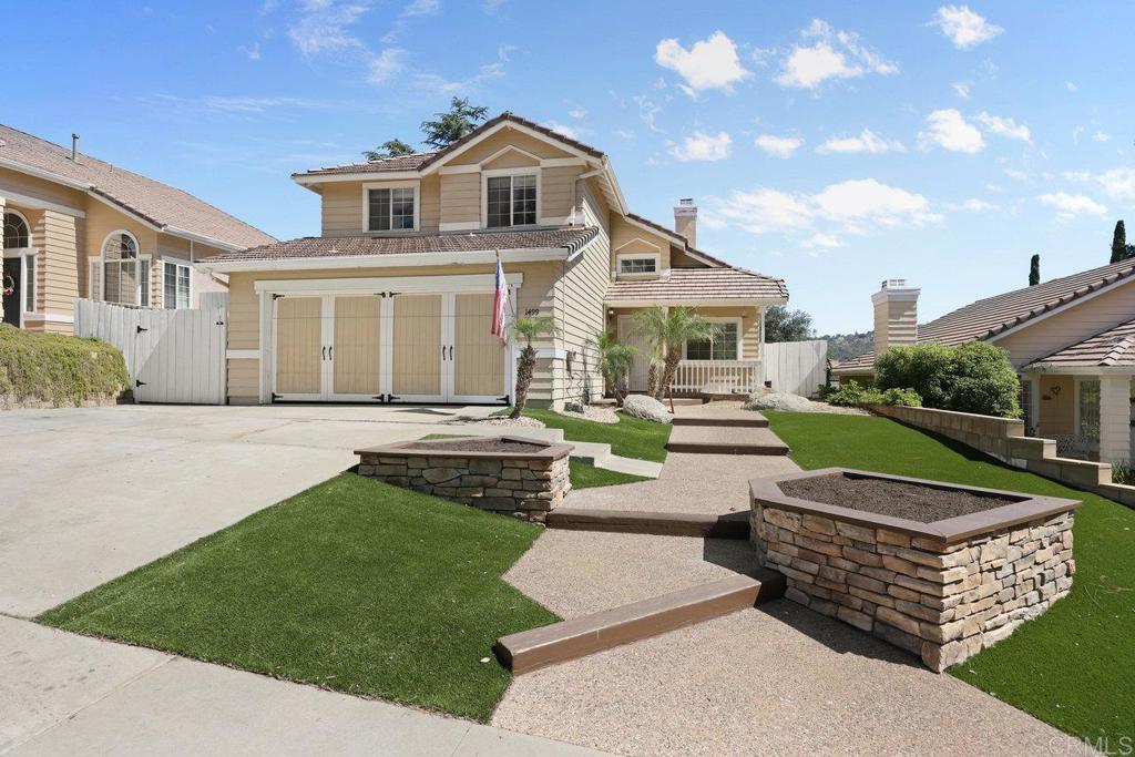Charming home located in the desirable community California Terrace in Alpine. This inviting two-story home offers comfort, space, and scenic mountain views. The light-filled interior features an open living room with abundant windows, a cozy two-sided fireplace, and a sliding glass door leading to the backyard. The kitchen boasts updated cabinets, granite countertops, ample storage, and space for a dining area plus access to the backyard. A versatile bonus room on the main level includes a full shower and closet—perfect as a guest suite, home office, or den. Upstairs, you’ll find two bedrooms with mirrored closets, a full hallway bathroom with a tub/shower enclosure, and a spacious primary suite complete with private bath, granite countertops, a built-in closet organizer, and a private balcony with beautiful views. Enjoy peaceful outdoor living on a lovely lot with a mature pine tree and beautiful northern views. The attached garage offers direct entry into the home and includes a laundry area. A wonderful value in a scenic and established neighborhood—don’t miss this Alpine gem!