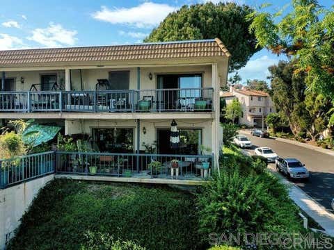 Photo of 2376 Caringa Way Way #G, Carlsbad, CA 92009 (MLS # 260018823SD)