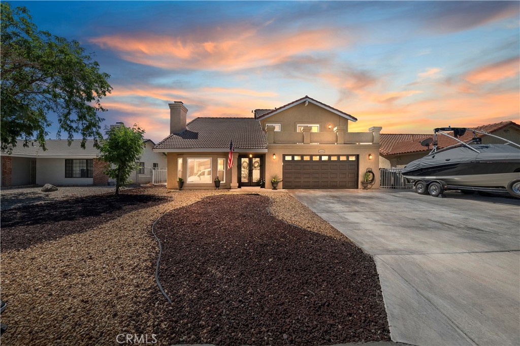 Charming Spring Valley Lake Home! This beautifully remodeled 4-bedroom, 3-bath home offers comfort, style, and plenty of space. The well-designed layout features a spacious kitchen that opens to a cozy family room—perfect for gatherings. A convenient downstairs bedroom and bath make hosting guests a breeze, while a separate living room with fireplace and a formal dining area add warmth and elegance.
Upstairs, enjoy two balconies—front and back—ideal for relaxing mornings or evening sunsets. The home also includes, a large landscaped backyard with RV access, and block wall fencing for privacy.
Living in Spring Valley Lake, one of Victorville’s most sought-after communities, means enjoying a 200-acre lake with a private marina, beach, fishing, boating, and 24-hour security. Optional golf and country club memberships provide even more leisure opportunities.
Conveniently located near the lake, this home blends relaxation, recreation, and modern living all in one! Schedule your showing today!