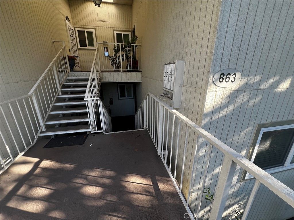 Photo of 863 Ronda Mendoza #B, Laguna Woods, CA 92637 (MLS # OC26013230)