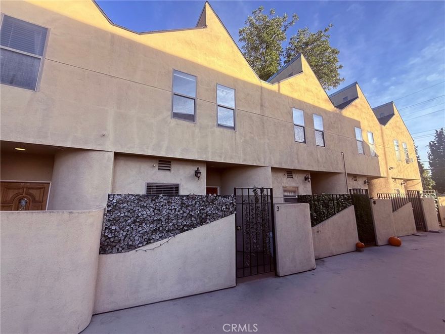 Discover this elegant two-bedroom, two-bath townhome in a private, 8-unit gated enclave on the Van Nuys / Valley Glen border. Featuring a welcoming living room with a cozy fireplace and sleek laminate flooring, this home exudes warmth and style. The updated kitchen boasts granite countertops and a convenient washer/dryer, while vaulted ceilings in both bedrooms create an airy, spacious ambiance. Step outside to your private patio, perfect for relaxing or entertaining, and enjoy the convenience of two dedicated parking spaces plus additional guest parking. Built in 1993, this boutique complex offers privacy and a low-density, intimate feel, all while being just minutes from the 405, 101, 5, and 170 freeways, as well as shopping, dining, and all the amenities of Van Nuys and Valley Glen. This home combines modern comfort, a functional layout, and a premier location. Motivated seller—don’t miss this exceptional opportunity!