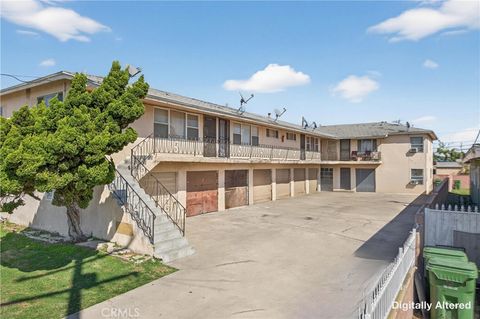 Photo of 1004 N Poinsettia Ave, Compton, CA 90221 (MLS # CV26053100)