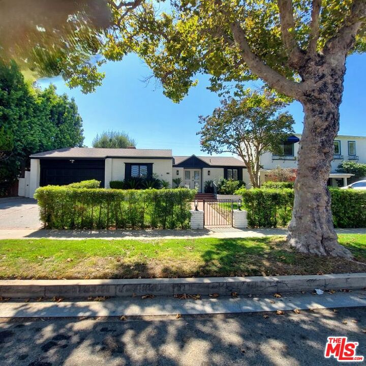 Available September 1st, possibly sooner unfurnished. 1 story Traditional home with all the charm one could ask for. Walking distance to Beverly Drive and Rodeo Drive. Approximately 2500 sqft of living space. Hardwood floors throughut and wonderful detailed ceilings. Formal entry with powder room + guest closet. Large main area with fireplace and doors that lead to the outside patio area. Main living spaces open onto the formal dining room with built in cabinetry for storage. Breakfast room off the Kitchen. 4 bedrooms and 2 full baths + good size den/office that could be used as another bedroom as it has a closet. 2 bedrooms open to the back grassy area. Outside off the dining room and living space is a covered patio to enjoy the weather year round. Side and back grassy area. Separate laundry room and extra storage room. 1 car garage with parking in front of it for 2 cars. Many upgrades were made.