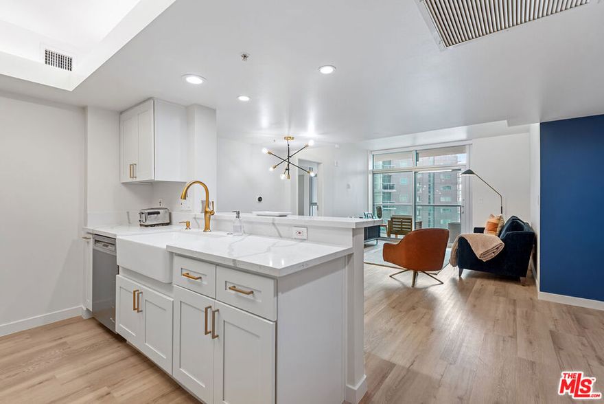 **Offered Fully Furnished or Un-furnished** Fully renovated 1 Bedroom unit with City, Mountain, and Marina views from the 14th floor of the full service, Azzurra! This pristine unit just underwent an extensive renovation throughout. Enjoy an open floor plan, gorgeous new wood floors, new stainless steel appliances, new counter tops, new cabinets and hardware, breakfast bar, den/office space, large bathroom with extra large soaking tub/new sinks/new mirrors, new cabinets/new hardware/etc., spacious balcony, custom built walk-in closet, brand new washer/dryer, electric shades throughout, 2 car parking and much more!  Rent includes cable, internet, water, and trash, along with access to Azzurra's extensive collection of resort-style amenities. These include 24-hour valet parking for guests, 24-hour front desk and security, concierge services, a rooftop spa and sky lounge with panoramic ocean views, an outdoor kitchen, a sparkling heated pool and spa, a business center, a media lounge, a fine art collection, and an indoor/outdoor professional fitness center equipped with a yoga and Pilates training studio, plus much more. Located just moments from the bike path, Marina access, Abbott Kinney, world famous beaches, dog walk, shops, trendy restaurants, dine-in theaters, LAX, and more!