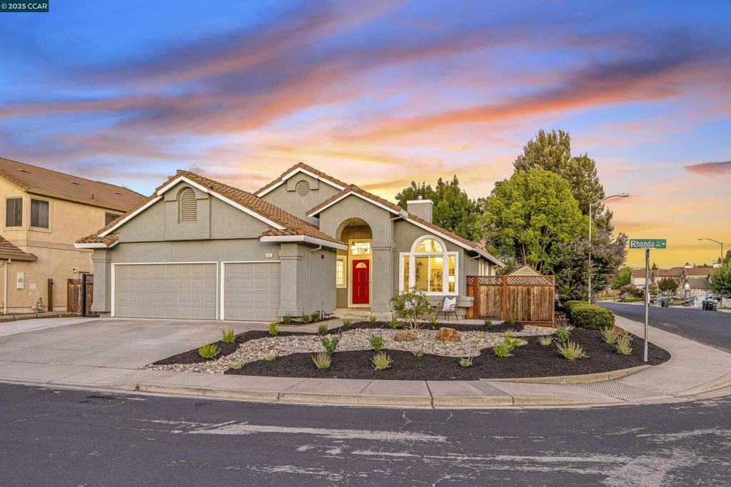 Welcome to 4801 Rhonda Ln, a beautiful home nestled in the vibrant community of Livermore, CA. This property offers an impressive 1,834 square feet of living space and is situated on a generous 7,944 square foot corner lot. As you enter this stunning residence, you are immediately greeted by high ceilings that create an atmosphere of openness and grandeur. The interior has been recently upgraded with new floors and fresh paint throughout. These enhancements add a modern touch to the home but also complement its timeless architectural design. The open concept layout seamlessly blends the kitchen, dining, and living areas together - perfect for those who appreciate fluidity in their home's design. For those who require additional storage or workspace, there is a three-car garage providing plenty of room for vehicles or other necessities. One of the standout features of this property is its location on a corner lot. This positioning allows for more privacy compared to other homes and affords it an abundance of natural light.