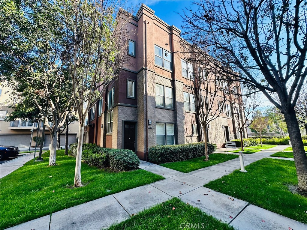 Welcome to this stunning 3-bedroom, 2-bathroom condominium in the highly desirable Amerige Heights community! This home features a spacious primary suite with a walk-in closet, an inviting open-concept living area, and a gourmet kitchen with granite countertops, stainless steel appliances, and custom slate tile flooring. Recently painted throughout with new laminate flooring, this home is clean and move-in ready. It includes a refrigerator, gas stove, microwave, new dishwasher, washer, and dryer for added convenience. The unit also offers a separate laundry room and a unique elevator from the garage, making it easy to lift heavy items upstairs. Enjoy direct access to a spacious 2-car tandem garage, plus access to fantastic community amenities, including a pool, spa, fitness center, and clubhouse. Located near the award-winning school, Robert C. Fisler (K-8), with Parks Junior High, and Sunny Hills High School nearby. This home is also close to shopping, dining, and entertainment. Experience the perfect blend of comfort and convenience—schedule a showing today!