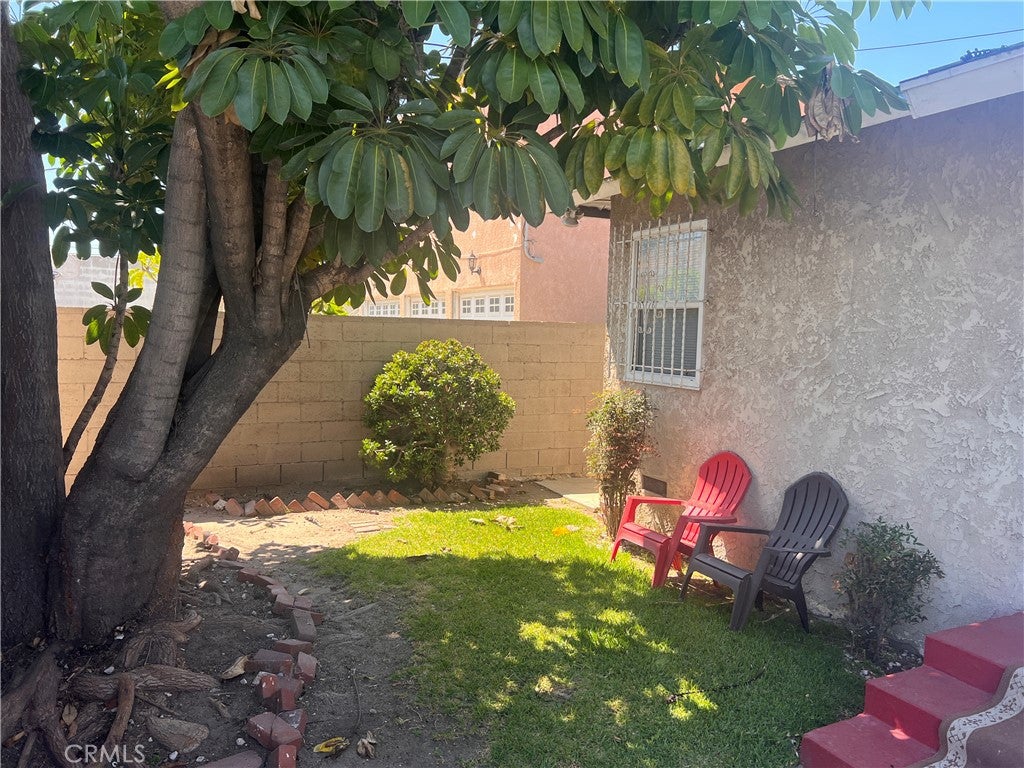 Photo of 1739 1741 W 105th Street, Los Angeles, CA 90047 (MLS # CV26112735)