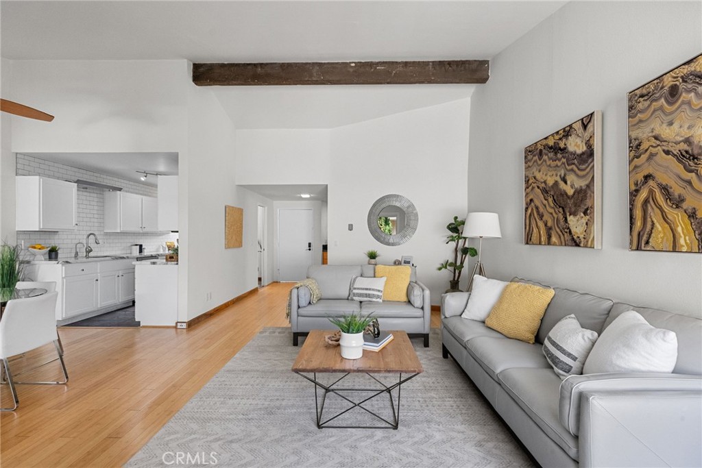 Light, style, and location come together in this top-floor corner condo located in the heart of Culver City. With vaulted ceilings and an abundance of natural light, this 2-bedroom, 2-bathroom home feels bright, airy, and incredibly inviting. Fresh interior paint and new bedroom carpeting enhance the move-in-ready appeal, while two private balconies offer the perfect spots to enjoy your morning coffee or unwind in the afternoon sun. The remodeled kitchen features modern cabinetry, subway tile backsplash, sleek countertops, and stainless steel appliances—all opening to the main living and dining areas for easy entertaining. A sunny breakfast nook adds flexibility—perfect for casual dining, a reading corner, or a work-from-home setup. Both bedrooms are generously sized, with the primary suite offering a large closet and private ensuite bath. The home also includes two side-by-side parking spaces in a gated garage, offering security and convenience in a prime location. Located in *The Californian*, a well-maintained complex just moments from Westfield Mall, parks, and walking trails. You’ll be just minutes from Playa Vista, Ivy Station, Downtown Culver City, and award-winning schools—not to mention convenient access to the beach, freeways, and tech hubs.