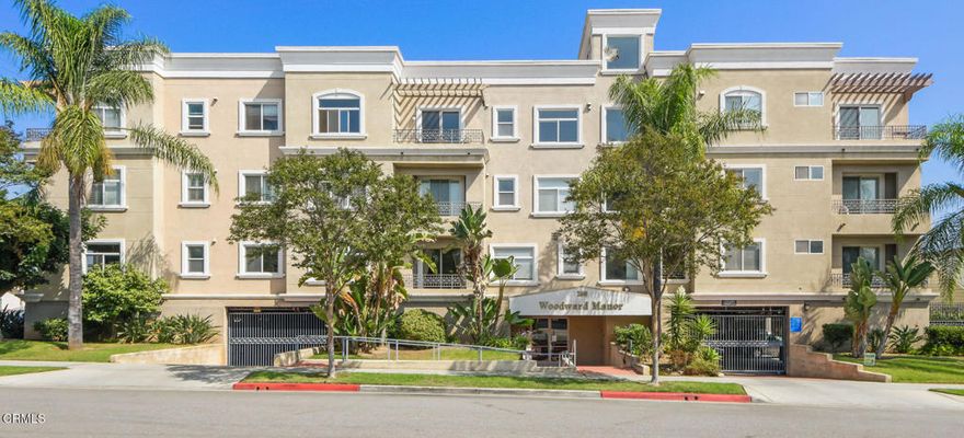 Welcome to this sophisticated 2-bedroom, 2-bath condominium in the stylish Woodward Manor complex. It is conveniently located just moments from all the excitement of Main Street in North Alhambra. This light-filled, top-floor unit is ideally set within the complex, with a great flow throughout and an open-concept floorplan. Beautiful new flooring throughout much of the home adds warmth and character, creating an inviting atmosphere. The bright and airy living room opens directly to the spacious dining area. The kitchen features granite countertops, stainless-steel appliances (including a new oven, dishwasher and microwave) as well as a spacious pantry. Down the hall, the primary suite features a dressing area with built-in cabinetry, a large closet, and an en-suite bathroom. It also features a balcony with wonderful city and treetop views. The second good sized bedroom also offers great views. Off the main hallway there is a three-quarter bathroom and a laundry area with a side-by-side washer and dryer, also included in the sale. The complex features a large recreation room off the lovely courtyard. This wonderful unit is open to all buyers; however, at least one occupant (occupant can be an owner, a roommate or a tenant) must be 62 years of age or older. Just moments from a variety of shopping and dining, this home has it all. Welcome home!