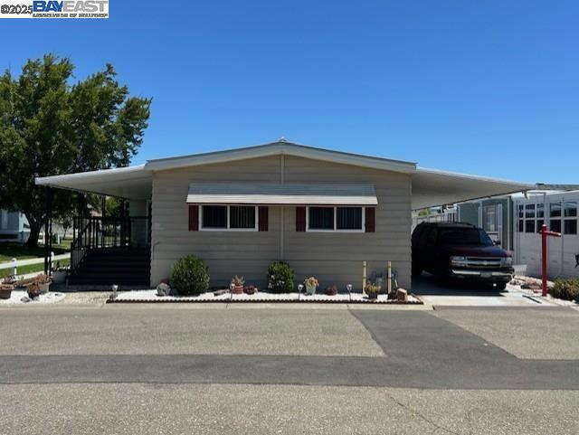 Ready for move in located in Hayward's Georgian Manor, this spacious home has: 2 bedrooms; 2 full baths; separate living and family rooms; built in bar area in family room; dining room with built it hutch; laminate flooring in living areas; dual pane windows; wide carport; 2 sheds; lovely cul-de-sac location over looking green built and more! Fireplaces: NO