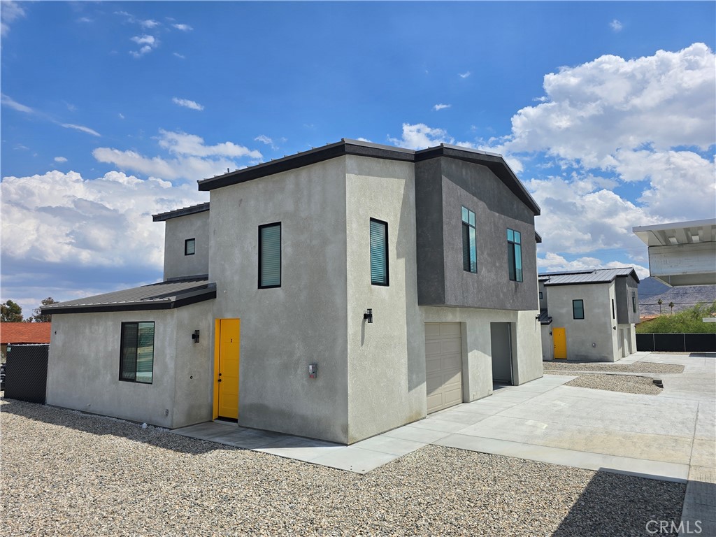 **Discover Your Dream 2 Bed, 2 Bath Luxury Condo in 29 Palms!**
Introducing our brand new, beautifully constructed 2-bedroom, 2-bath luxury condo units, conveniently located in the heart of 29 Palms. These modern, two-story condos are designed for the discerning renter looking for stylish and comfortable living.
**Key Features:**
- **Private Outdoor Space:** Enjoy your own fenced backyard, perfect for relaxing or entertaining.
- **Dual Heating & Cooling Zones:** Experience year-round comfort with efficient climate control tailored to your preferences.
- **High-End Appliances:** Each unit comes equipped with stainless steel appliances, including a washer and dryer for ultimate convenience.
- **Elegant Interiors:** Solid quartz countertops and luxury vinyl plank (LVP) flooring flow throughout, blending style with functionality.
- **Secure Parking:** A single-car garage provides not only protected parking but additional storage opportunities.
- **EV Ready:** Each unit includes a 50 Amp EV car charger, making it easy to charge your electric vehicle right at home.
Don't miss out on this exceptional opportunity to elevate your living experience in a prime location. Contact us today to schedule a tour of these fantastic luxury condos and see for yourself what makes them truly special!