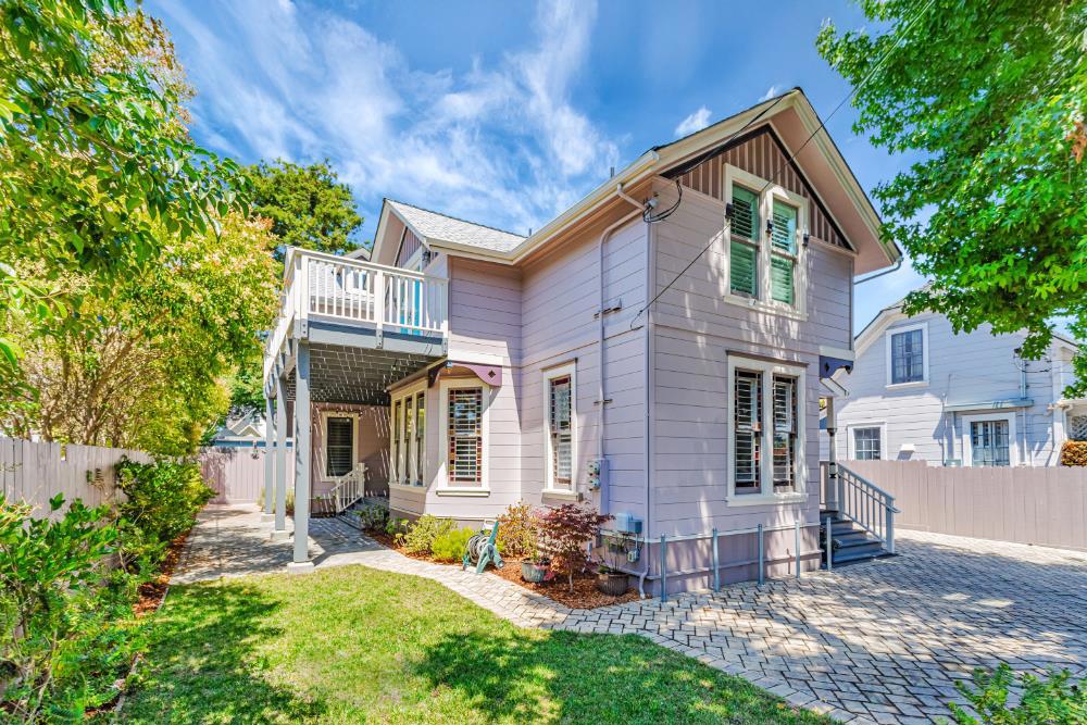 Gorgeous Historic Eastlake Victorian beach home! PRIME LOCATION - steps to the beach, the wharf, and the Boardwalk. Enjoy walking, biking, fishing, surfing, shopping and relax with gourmet coffee & fine dining! Legal duplex with open floor plans, keyless entry, smart TV, gated parking, USB outlets, dimmers. Complete permitted remodel in 2017, with high quality material & craftmanship, and impeccable attention to detail. Energy efficient, awarded Green Building status by the city of Santa Cruz. Plantation shutters, beautiful stain glass windows, durable bamboo hardwood floors with radiant heating, French doors, granite countertops, large functional islands, custom built-in cabinets, stainless steel appliances. Wrought iron security gate. Separate laundry in each unit. Upstairs unit has cozy 3 bedrooms, 2 bathrooms, two private decks to soak in the warm sunshine and feel the cool ocean breeze! Skylights and windows for abundance of natural sunlight. Downstairs is a comfortable high ceiling home with 3 bedrooms, 2 1/2 bathrooms. Ensuite bedroom. Low maintenance private patio & backyard. Amazing to live in and/or rent out one or both units at premium vacation pricing! https://www.airbnb.com/rooms/49640661?source_impression_id=p3_1756342224_P30WtCIfIH4UPX7p