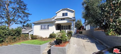 Photo of 1240 S Lucerne Boulevard, Los Angeles, CA 90019 (MLS # 26662727)