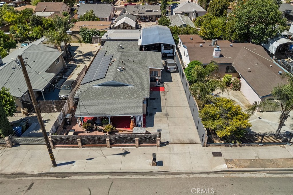 Great Opportunity in Sylmar – Perfect for a Large Family! Welcome to this spacious single-family home featuring 4 bedrooms, 3 bathrooms, and 1,708 sq. ft. of living space. The property is designed with flexibility in mind, offering two separate living quarters: a main home with 3 bedrooms and 2 bathrooms, plus an additional 1-bedroom, 1-bath unit—ideal for extended family or guests. The updated kitchen boasts elegant porcelain tile floors, complemented by newer windows and a newer central A/C & heating system for year-round comfort. The home also includes paid solar panels, adding energy efficiency and cost savings. The primary suite provides a comfortable retreat, while the expansive backyard features a massive metal carport—perfect for car enthusiasts or extra covered parking. Conveniently located near the 210 Freeway, this home offers easy access to shopping, dining, and commuting routes. Don’t miss this versatile and move-in ready property!
