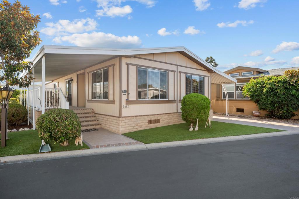 Welcome to this lovely move-in ready home located in one of the most desirable locations within the sought-after 55+ guard-gated and resident owned Rancho Carlsbad community. Walk into a very large inviting living room and family room filled with natural light- perfect for relaxing or entertaining. Adjacent to the family room is a spacious formal dining room, ideal for hosting guests. The large galley-style kitchen offers plenty of storage and counter space for meal prep, along with a cozy kitchen nook for additional seating. There is a lovely and spacious primary suite that features a large walk-in closet and a well-appointed bathroom with extra storage cabinets. The home also offers a generously sized guest bedroom and bath, providing comfort and privacy for visitors. You'll love the spacious laundry room with plenty of storage throughout the home. Step outside to a charming, large front porch with peaceful views of the open fields- an ideal spot for morning coffee or evening relaxation. Rancho Carlsbad offers resort-style amenities including a pool, spa, gym, tennis and pickleball courts, dog park, and over 30 clubs and social activities. Conveniently located near shopping, fine dining, and beautiful beaches. Don't miss this opportunity to enjoy active senior living at it's finest!