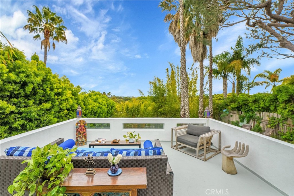 Don’t miss this rare opportunity to own a beautifully upgraded home in Santa Monica’s coveted Sunset Park neighborhood. Perched on a unique view lot, the property offers sweeping vistas that stretch all the way to LAX. The bright, open-concept layout features a sleek modern kitchen with stainless steel appliances and high-end finishes throughout, including a tankless water heater, solar panels, and other energy-efficient upgrades.
Upstairs, you’ll find three spacious bedrooms and two stylish bathrooms. The lower level includes a versatile bonus room with its own bath — perfect for guests, a home office, or creative studio. Outside, a serene bamboo-lined backyard invites you to relax in the included private hot tub and soak in the peaceful surroundings.
Located just one block from the future Great Park and minutes from Ocean Park Boulevard’s vibrant shops, cafes, and restaurants — and only two miles from the beach — this home offers the ultimate California lifestyle. Homes with this combination of location, views, and thoughtful upgrades are incredibly rare. Don’t let it slip away!