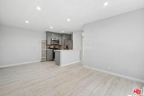 Photo of 852 N Bunker Hill Avenue #105, Los Angeles, CA 90012 (MLS # 26836959)