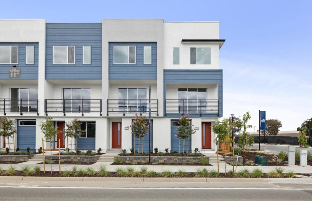 This beautiful home at The District offers a spacious 1572 square feet floor plan with 3 bedrooms and 3 bathrooms. This home is a corner home with plenty of windows for wonderful natural light and offers open concept living. Additionally, the home includes upgraded cabinets, upgraded luxury vinyl plank flooring throughout, and upgraded KitchenAid appliances. This is a wonderful home in the city of Milpitas; close to everything with a true community feeling for our residents. Our model homes are now open and ready to tour! This home will be ready for move in September/October/November 2025. Call Jillian Medeiros at 858-442-2921 or Jim Pieper at 408-828-6449. Photos are of model home not of actual home.