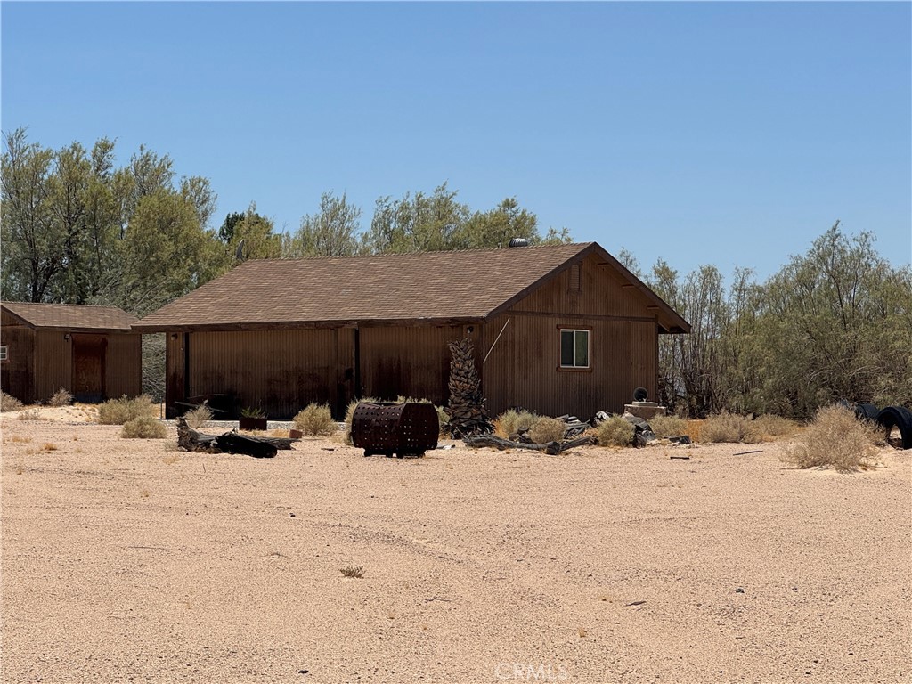 What a great property for sale in Newberry Springs. Situated in the Lake Jodi Association. This property is a corner lot with the open desert just across the road. It features 2 acres of fenced land. There is large garage with power already to it, including 220v. There was once a mobile home on the property so there is a septic , water, propane, and electricity of coarse. Enjoy the lake or the desert at Lake Jodi. It is comprised of 58 lots in a gated lake community that was developed in the 1970s. The lake is estimated to be 20-30 acres (exact size is unknown). Residents enjoy boating, waterskiing, fishing and swimming with their monthly assessments. Which cover water, lake and grounds maintenance.