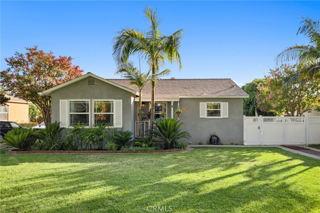 Discover the perfect blend of mid-century charm and modern living! This beautifully and lovingly updated single-story home showcases stunning curb appeal, thoughtful interior design, and an gardeners dream backyard with wonderful landscape design and numerous fruit trees such as 3 avocado trees, peach, fig. fiji apple, plum, apricot, meyer lemon, orange, tangerine
• Bright, open-concept living with gleaming hardwood floors throughout • Stunning remodeled kitchen featuring custom cabinetry, quartz countertops, and stainless steel appliances , pot filler and farmhouse sink. • Spacious living room with large windows and ceiling fan for year-round comfort • Serene master bedroom with abundant natural light and garden views • Fresh, contemporary finishes throughout while maintaining original character *updated bath that adheres to the period of this home* Kitchen and bath renovated in the last 5 to 7 years ,* hardwood floors * new plumbing in the last 7 years*tankless water heater*Roof and stucc0 approx 10 years old
• Stunning drought-tolerant garden with mature fruit trees and lush tropical plantings • Multiple outdoor entertaining areas with covered patio featuring decorative wall art • Beautiful hardscaping with natural stone pathways and professional landscaping • Productive edible garden with established citrus and fruit-bearing trees • Charming garden pathways winding through thoughtfully designed plant beds • Private, serene setting perfect for relaxation and entertaining* detached garage
• Covered outdoor living space with exposed beam ceiling and modern finishes • Large sliding doors creating seamless transition to garden spaces • Perfect setup for year-round California living and al fresco dining
Charming ranch-style home with manicured front lawn and mature palm trees • Classic California architecture with clean lines and inviting facade • Well-maintained exterior with thoughtful landscaping
This exceptional property offers the rare opportunity to own a meticulously maintained home that seamlessly combines indoor comfort with resort-style outdoor living. The thoughtful renovations honor the home’s original character while providing all modern conveniences. The mature plantings and established fruit trees provide both beauty and bounty, while the multiple entertaining spaces offer endless possibilities for California living.
*Don’t miss this unique opportunity to own a complete California lifestyle property!*