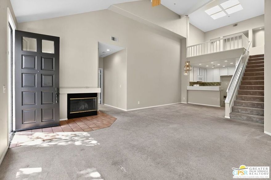 Welcome to this beautifully maintained 2-bedroom, 2-bathroom loft-style townhome located in the highly desirable Tustin Ranch community of Arcada. This light-filled home features high ceilings, recessed lighting, ceiling fans, and an abundance of natural light throughout. The spacious loft area offers flexible use as an office, guest space, or cozy retreat. Enjoy a charming balcony, a warm fireplace, and well-sized closets and rooms for comfortable living. The kitchen showcases white cabinetry with matching white appliances, including a stove, dishwasher, and microwave, perfectly complementing the home's fresh paint. Additional highlights include an in-unit laundry room with washer and dryer hookups and a rare direct-access 2-car garage standout feature in this community. Recently painted and ready for immediate move-in, this home sits within the smoke-free Arcada community, which offers resort-style amenities including a sparkling pool, relaxing hot tub, picnic area, and built-in BBQ's ideal for enjoying sunny California days. No pets or smokers per owner.