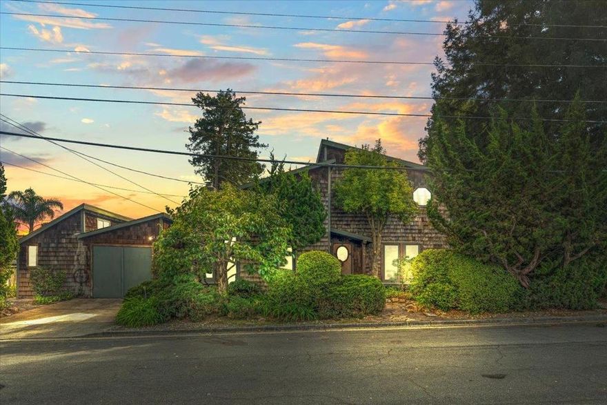 Welcome to 114 Sutphen street, a lovely Santa Cruz home that blends character with convenience. Set just off Pasatiempo Drive, the property offers an easy commute while keeping you close to everything the coast has to offer. Santa Cruz living means a mix of laid-back charm & everyday practicality-minutes from beaches, the Boardwalk, downtown, shopping, Back-Nine restaurant, the harbor, & UCSC, this is a TEN, yet tucked in a very friendly neighborhood near the renowned Pasatiempo Golf course. With unique design touches like stained glass windows, spacious suites, and inviting outdoor areas, this home has a warm personality that stands out. Whether you're relaxing on the wraparound deck, enjoying the koi pond in the backyard with water-fall feature, hoping in the hot tub, or taking a short drive into town, this is a place designed for comfort & connection. Come take a look.