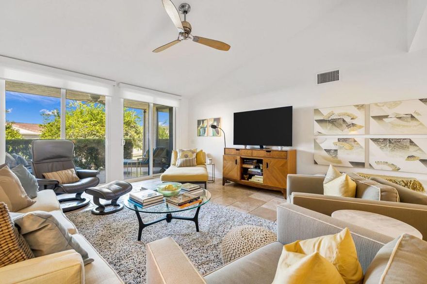 Experience classic Palm Springs living in this stylishly updated Canyon South 1 condo, designed by noted architect Laszlo Sandor. Built in 1974, this 2-bedroom, 2-bath home spans 1,325 sq. ft.  with clean lines, soaring ceilings, and mountain views throughout. Upgrades include a refreshed kitchen, renovated bathrooms, and updated windows and sliders. Stone tile floors extend to two private patios, both with mountain views.  Fully equipped with laundry and a one-car garage, this home is move-in ready. Canyon South 1 features three pools and spas, and a conveniently located south Palm Springs setting just minutes from Smoke Tree Village, Koffi, and downtown Palm Springs. HOA dues include water, trash, exterior pest control, roof, and exterior paint. Ideal as a full-time residence or weekend getaway, this condo blends architectural style with easy desert living.