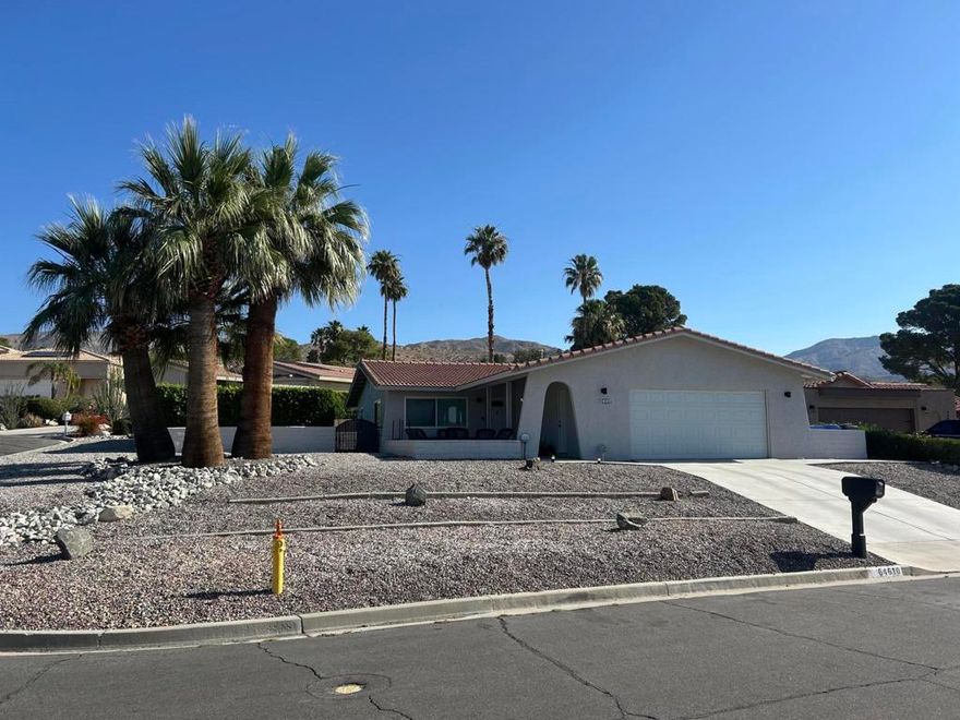 Beautifully upgraded home with panoramic views in Mission Lakes Country Club! This 2 bed, 2 bath home offers 1,510 sq ft of stylish living on an oversized 10,109 sq ft corner lot. Located in a community elevated 1,500 feet above the desert floor, you'll enjoy expansive views of the Coachella Valley, Mt. San Jacinto, and Mt. San Gorgonio.The current owners have completed a series of thoughtful upgrades including, a putting green, new flooring throughout, fresh interior paint, a new HVAC system, and a new water heater. Additional features include a custom-built golf cart garage with automatic opener and a professionally redesigned exterior drainage system with enhanced concrete flatwork and hardscaping for easy outdoor living.Just a 20-minute drive from Palm Springs International Airport, this home offers a perfect blend of resort lifestyle and convenience. Homeownership includes unlimited golf for two on title at the Ted Robinson-designed championship course, plus access to a full range of amenities--clubhouse, restaurant, resort-style pool and spa, tennis, pickleball, and a fitness center. Ideal as a full-time home, seasonal retreat, or investment opportunity in one of the desert's most scenic and welcoming golf communities!