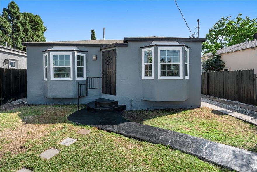 Don’t Miss Out on This Beauty! Discover this beautifully renovated gem in the heart of Los Angeles. Thoughtfully upgraded with elegant finishes, this home features a bright, modern white kitchen with stylish cabinetry and sleek countertops — perfect for both cooking and entertaining. This charming residence offers 2 spacious bedrooms and 1 beautifully updated bathroom, showcasing designer tile walls and contemporary flooring. Enjoy tile flooring throughout the main living areas and warm laminate wood floors in the bedrooms for a cozy yet low-maintenance feel. Additional upgrades include newer plumbing, updated electrical, and brand-new front windows, ensuring peace of mind and modern comfort. Outside, you’ll find a detached garage, plus a long driveway providing ample parking. Conveniently located near major freeways, schools, shopping centers, and parks — this move-in-ready home truly has it all. Come take a tour and fall in love!