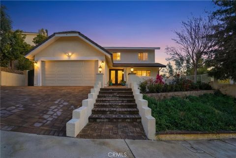 Photo of 24541 Gardenstone Lane Ln, West Hills, CA 91307 (MLS # SR26046671)