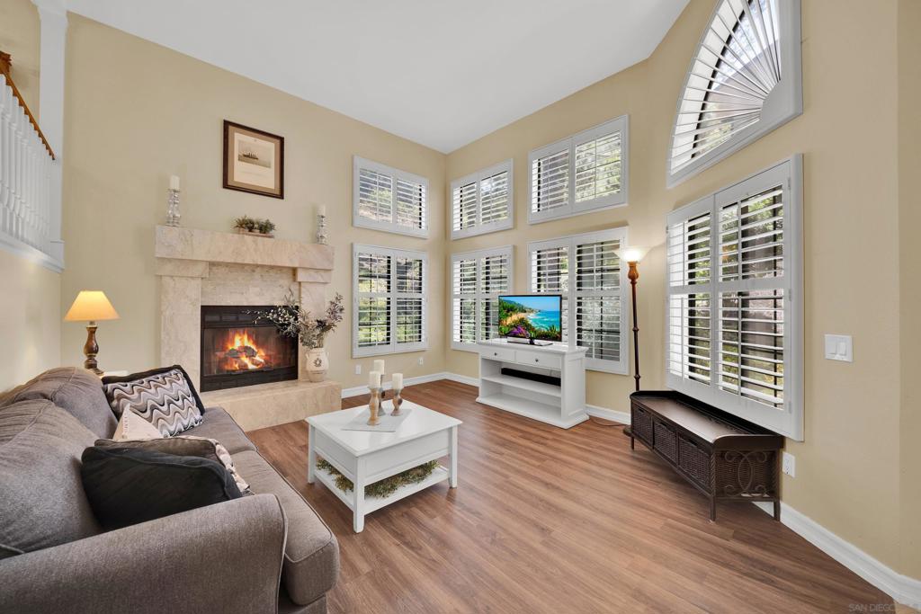 Elegant large 3 bed/2.5 bath end unit townhome in the coveted Shadow Glen complex in beautiful San Carlos! Expansive living room features a cathedral ceiling, grand gas fireplace, and copious natural light. Second level includes new flooring and a dining room with an airy feel as it overlooks the living room and gives way through sliders to the outside private deck. Kitchen has ample counter and storage space. See supplement. Large primary bedroom suite has vaulted ceilings and spacious feel with an accommodating walk-in closet and luxurious bathroom. Convenient attached 2 car garage. Easy access to shopping centers, restaurants, and freeways. Don't miss this excellent opportunity!