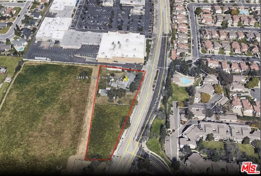 Commercial Land prime location in Pomona 1.46 acres 2 existing Houses on the lot, house one 4bd, 2 ba, all remodeled the other one 2bd, 1ba It's great opportunity for developers investors next-door to Walmart shopping center mixed use contact agent for all details.