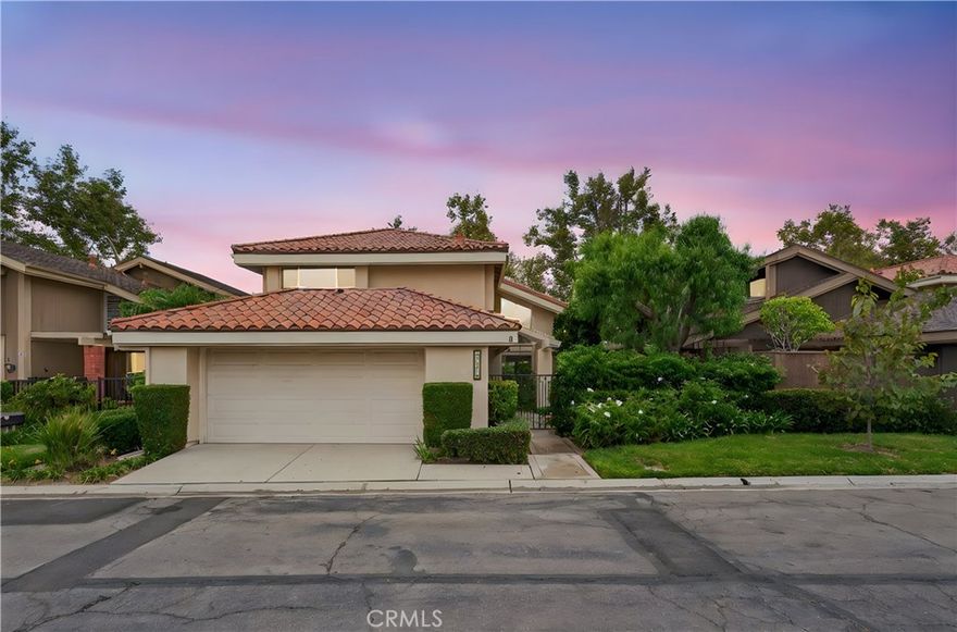 A rare find within the prestigious, guard-gated community of Fairway Village—513 Pebble Beach offers the privacy of a detached home, a highly sought-after feature in this neighborhood. With 2,373 square feet of spacious living, this four-bedroom, three-bath residence presents an exceptional opportunity to personalize a timeless floor plan with your own modern touches. The inviting entry opens to soaring vaulted ceilings and expansive windows that fill the home with natural light. The open-concept living and dining areas flow seamlessly into a well-sized kitchen and adjacent family room—perfect for gathering and entertaining. A highly requested feature, the downstairs bedroom and full bath offer convenience for guests or multigenerational living. Upstairs, the primary suite serves as a private retreat with a generous walk-in closet, balcony, and large en-suite bathroom. Two additional bedrooms provide versatility for family, home office, or creative space. The backyard offers a peaceful setting with expansive patio and a spa jacuzzi that has a soothing waterfall feature, perfect for relaxing after a long day. Thoughtfully and strategically priced, this home takes into account its light renovation potential—offering a chance to refresh and elevate it to your style while enjoying the incredible value of one of the few detached homes within Fairway Village. Residents benefit from 24-hour guard-gated security, lush greenbelts, walking trails, two pools and spas, tennis courts, a clubhouse, and RV parking—all within minutes of top-rated schools, St. Jude Hospital, Brea Mall, and local parks. Detached homes in this community are rarely available—schedule your private showing today and experience the exceptional lifestyle that Fairway Village has to offer.