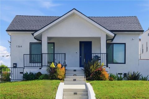 Photo of 1364 S Ridgeley Dr, Los Angeles, CA 90019 (MLS # SR26048644)