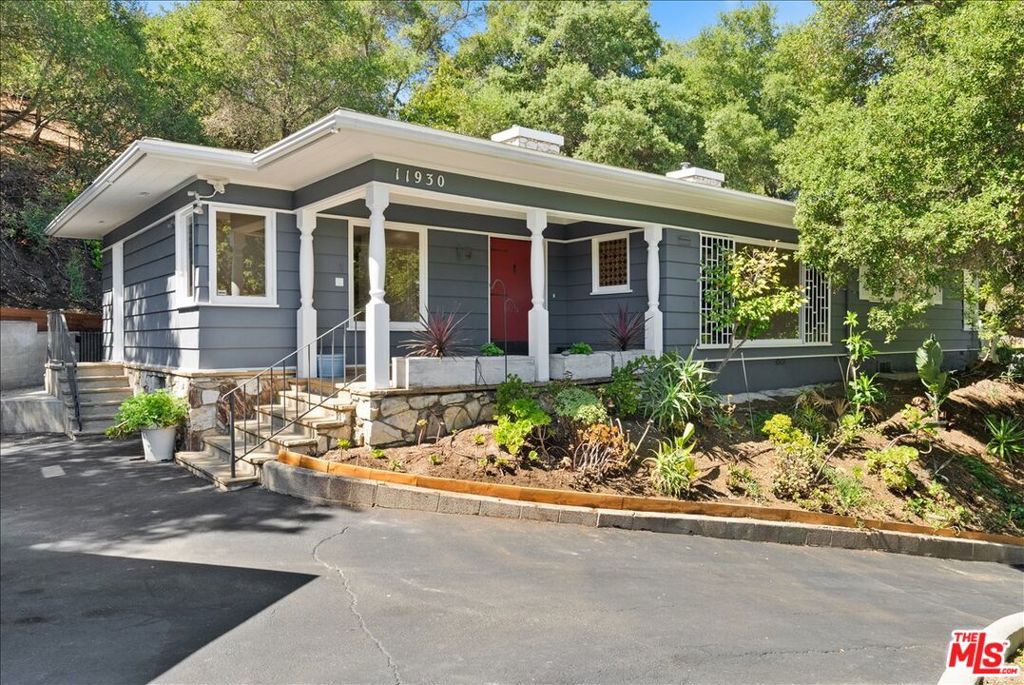 Located in the heart of the coveted Fryman Estates area, escape from the hustle and bustle, yet moments away from everything Studio City has to offer. This rustic retreat is perched above the street overlooking majestic oaks and peaceful hillside views. Located amidst grand estate homes and nearby hiking trails. Home retains much of its original charm, with newly refinished oak hardwood floors throughout, and with tasteful upgrades, including newer dishwasher, gas range, and stainless-steel refrigerator. Home offers generous cabinet, closet and storage space. Enjoy the great room, with a wood burning fireplace, and a view window that captures the surrounding beauty and peacefulness. Steps in the hillside behind the house lead to an elevated patio area, and there is also a patio area on the side of the house. Located in the award winning Carpenter School District.