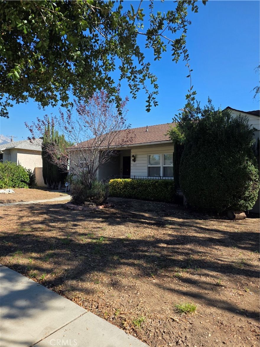 Move-in ready and full of character!

Step into this charming 3-bedroom, 1-bath home that captures the warmth and style of mid-century design. You’ll love the thoughtful built-ins throughout — from shelving and cabinets to extra storage above and below the bedroom closets. The kitchen features two tall pantries, while the bathroom offers a relaxing spa tub.



Ceiling fans keep every room comfortable, and the spacious family room addition with its cozy fireplace is perfect for gatherings and celebrations year-round.



Outside, the fenced backyard is a blank canvas ready for your personal touch — ideal for gardening, entertaining, or simply relaxing. The single-car garage provides plenty of extra storage, with convenient alley access and additional street parking available.



Located within walking distance to Upland Memorial Park and San Antonio Regional Hospital, and just minutes from Historic Downtown Upland’s shops, dining, and weekly Farmers Market. Red Hill Country Club and Cable Airport are also nearby.



Pet-friendly for one pet under 45 pounds.