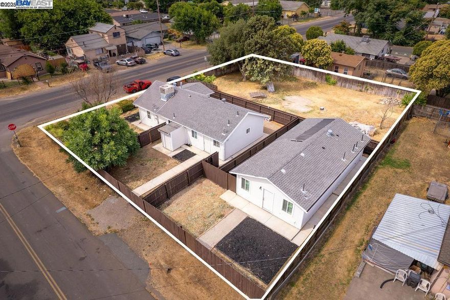 Once in a Life Time Opportunity to OWN 2 Houses On One Parcel. A LARGE 15k SQ FT FLAT LOT. (Main Home, ADU & Vacant Lot) This Picture Perfect Corner Lot Renovated Home + ADU Has Side Entrance Access. The Front Home Consist of 3 Bedrooms, 2 Bathrooms With Approx 1072 sq ft Located At 4733 Washington St. The Rear Home (ADU) With Its Own Side Entrance Is Located Off N Wagner, Consist Of 2 Bed 2 Bath With Approx 780 Living Sq Ft..The Beautiful Details Are Accentuated: New Fabulous Laminate Floors, New Designer Paint, New Custom Cabinetry, New Subway Backsplash, New Quartz Countertop, New Stainless Steel Appliances. Both The Home & ADU Goes Way Beyond Your Checklist Of Wants And Needs With New Custom Baths, New Plumbing, New Electrical, New Electric AC/Heating, New Shingle Roof, New DP Windows, New Insulation, New Pattern Bath Tiles, Etc. The Empty Lot Is Adjacent To Both Homes which is Currently Fenced Off For Backyard Use For The Main Home & Adu. Endless Potential Possibilities to Build a Duplex, An Additional Home, Parking A RV, Work Trucks, Grow Your Own Organic Vegetable Garden or for Family Entertainment!! Great For Multi Generational Families, Or Investment Property for Cash Flow. Live in One & Rent Out the Other!