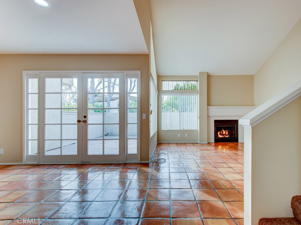 Welcome to the nice neighborhood of Princeton Townhomes, Irvine. This charming 2-bedroom home is located in one of the best areas in University Town Center. Spacious living room with fireplace, high ceiling, and natural light. Kitchen has a convenient breakfast bar. Dining area has a French door that opens to a large backyard. Both bedrooms are on the second floor. Direct access to garage. 1-car garage, 1 carport, and 1 overnight parking permit. (Total: 3 parking spots). Upgrades include a brand new water heater, a newer dishwasher and kitchen sink, and freshly touched-up paint. Enjoy the convenient location to parks, restaurants, shopping center and freeways I-405 and I-5. Short distance to UCI, Trader Joe's, and Target. Amenities include association pool, spa and tennis courts. Award-winning University High School.
