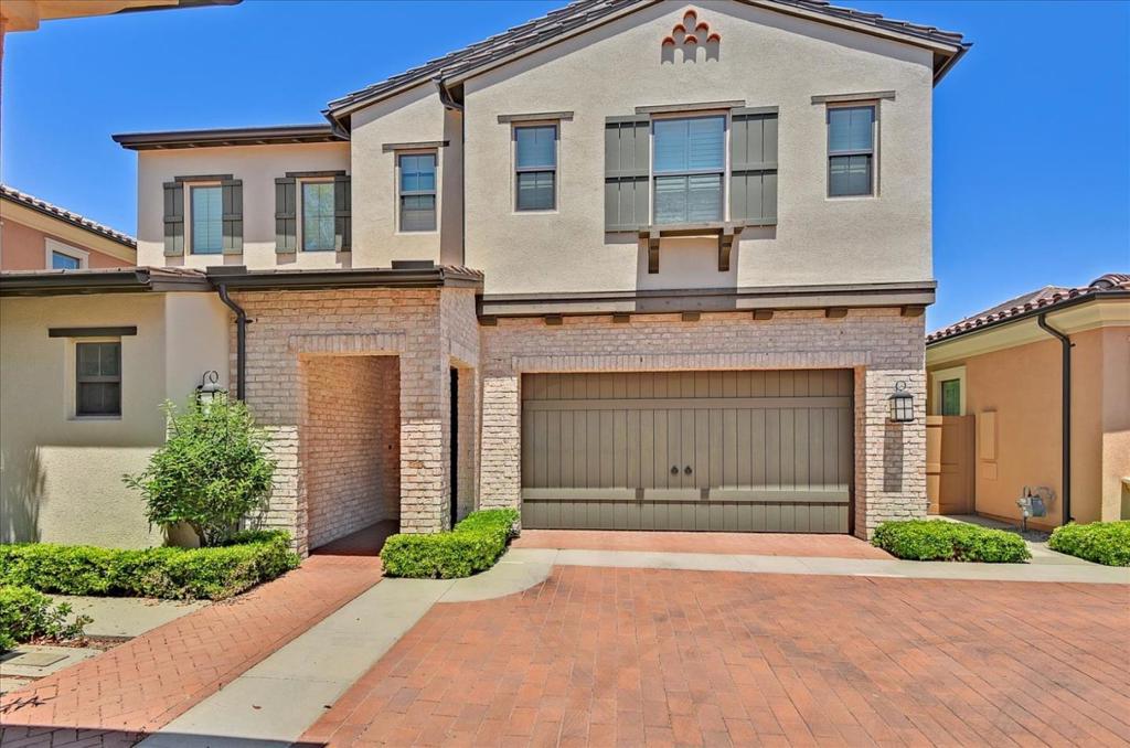 Dont miss this 4-bedroom home in Irvines hottest community - Eastwood Village! Open floor plan finished with upgraded hardwood flooring, an adjacent patio accessible by the glass sliding door. Automatic irrigation system, automatic landscape lights, and water softener/cleaning system also installed! A fabulous custom-design gourmet kitchen overlooks the common area. Vent hood with chimney to ceiling. You are to enjoy the ultra-generous countertops and cabinetry, with an oversized kitchen island! The master bedroom comes with a premium ensuite with a huge walk-in closet, separate bathtub and a glass-enclosed shower! Your new home gives you instant access to beautiful parks, private community swimming pools, spas, clubhouses, tennis courts, playgrounds, picnic areas, and walking/biking trails. Great neighborhood schools: Eastwood Village Elementary, Sierra Vista Middle School, and Northwood High School are all nearby! Pet Friendly Pet Deposit - $500