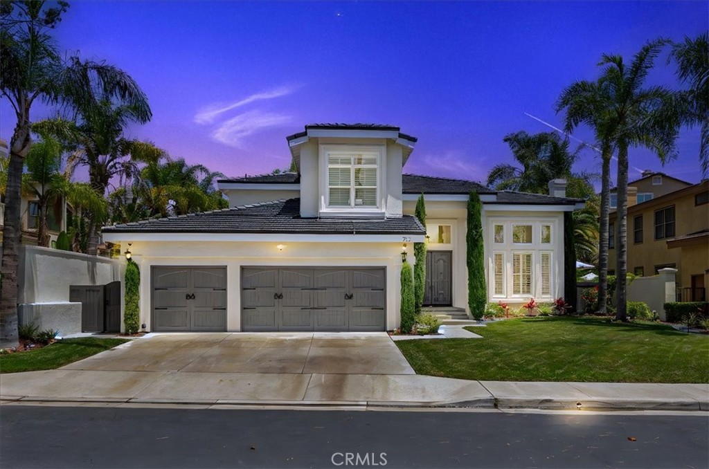 Exquisite Luxury Behind the Gates of Belsomet. Welcome to this exceptional residence nestled within the prestigious 24-hour guard-gated community of Belsomet in Anaheim Hills. Set on a meticulously landscaped 10,200 sq ft lot, this elegant single-family home offers approximately 3,097 sq ft of refined living space, featuring four bedrooms including a versatile main-level room currently used as a custom office and three full bathrooms. A rare blend of privacy, comfort, and upscale living awaits. Extensively remodeled with over $500,000 in high-end upgrades, the home showcases new hardwood flooring, solid wood interior doors, custom French doors, fresh designer paint, upgraded lighting, and wrought iron staircase. The re-imagined kitchen features custom cabinetry, quartzite countertops, and high end Monogram Appliances, while the bathrooms have been luxuriously updated with porcelain tile, custom finishes, and frameless glass enclosures. The primary suite is a tranquil retreat with a spa-like bath featuring marble tile, a soaking tub, and walk-in shower. Additional upgrades include a recently replaced HVAC system with dual compressors and furnaces, new water heater, fully custom closets in all bedrooms, and three beautifully retiled fireplaces including an electric fireplace in the primary suite. The laundry room and garage have also been meticulously updated with premium finishes and thoughtful touches throughout. The exterior is equally impressive with fresh paint, new lighting, a new tile roof, and a new solar system (both of which will be paid off by the seller through escrow at closings). The resort-style backyard features a newly renovated Pebble Tec pool with Baja shelf, updated lighting, a removable safety fence, Sonos sound system, and ample space for outdoor entertaining, including a dedicated basketball area and kids playground set. The grounds have been professionally landscaped with new grass, plants, and a modern sprinkler and drip system covering the hill, front, and side yards. Perfectly located near top-rated schools, shopping, dining, parks, and freeways, this turnkey home offers a rare opportunity to own in one of Anaheim Hills' most sought-after communities.