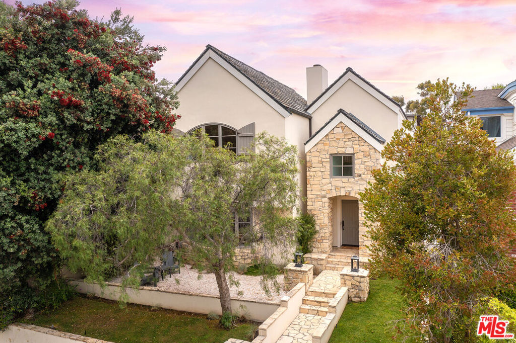 Welcome home to 755 31st St, where elegance and timeless architecture reside on one of the best tree-lined streets in Manhattan Beach. Beautifully situated and elevated on a hill, makes for dramatic curb appeal and first impression. Additionally, the Cul de sac behind the home offers maximum privacy and the ultimate beach family lifestyle. As you enter the captivating foyer with soaring ceilings, newly designed stairwell with gorgeous light greets one's eyes through sky-lights and high placed windows. Beautifully remodeled interiors and refinished stunning ceiling beams bring warmth and sophistication to every room. Chef's kitchen with top-of-the-line professional appliances, hand-distressed custom cabinetry and gorgeous counters makes this entertainers delight. Featuring four large bedrooms with every bedroom having their own en-suite baths along with their own oversized closet space! A custom kids playroom designed with climbing gym and acrobatic swing makes it a kids dream to come home and play for hours. Sprawling primary suite with vaulted ceilings and the accoutrements of a luxurious spa. Located west of Laurel, the home is situated in the sought-after Grandview Elementary School district! What more can one ask for!