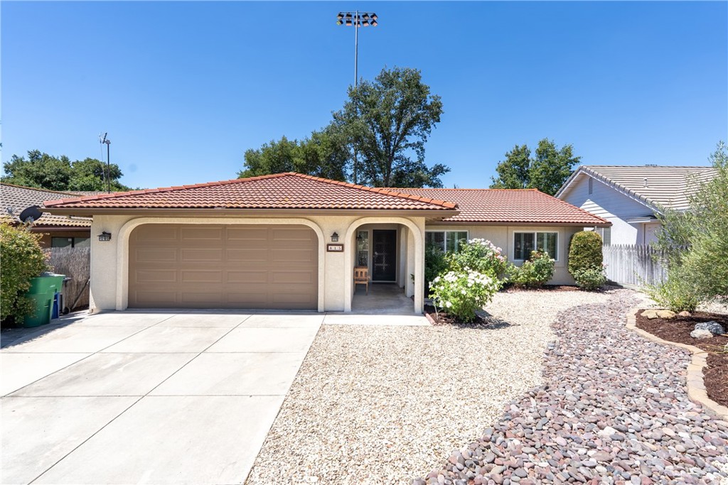 This beautifully maintained single-level 3-bedroom, 2-bath home combines comfort, style, and convenience in an ideal location. Offering approximately 1,570 sq. ft. of living space, the interior features vaulted ceilings in the living room, recessed lighting, upgraded dual-pane windows, and a cozy gas fireplace with direct patio access. The kitchen is a standout, with quartz counters, a custom tile backsplash, and a deep single-basin sink that blends functionality with modern appeal. Each bathroom offers spacious vanities, quartz counters, and designer lighting fixtures. Both the front and back yards are designed for easy upkeep, with a covered deck and private spa perfect for year-round relaxation or entertaining. Located just minutes from schools, shopping, and freeway connections, this move-in-ready home is prepared to welcome its next caretaker.
