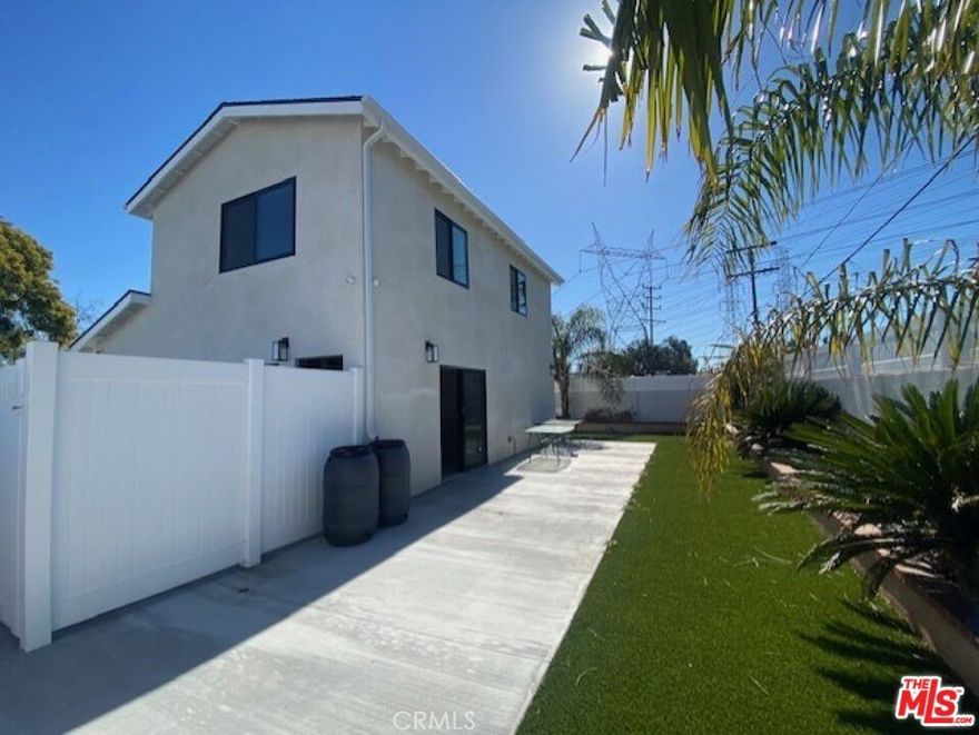 This newly built and fully furnished ADU in North Hollywood offers 3 bedrooms, 2 bathrooms, and is now available for rent. Situated in a secure, peaceful neighborhood, the property features a bright, spacious family room that seamlessly connects to a modern kitchen equipped with sleek grey cabinets and stainless-steel appliances. The main floor includes one bedroom with a walk-in closet and a bathroom featuring a bathtub and a shower stall. Upstairs, you'll find two additional bedrooms, a full bathroom, and a convenient in-home laundry unit. The ADU is designed with energy-efficient windows and HVAC to ensure cost-effective climate control. The home's location is ideal, with proximity to shopping and the metro, providing easy access to various areas in Los Angeles.