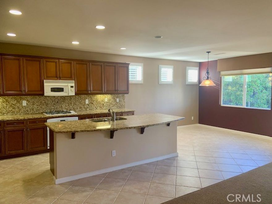 55+ Age restricted, Gated Community TRILOGY at Glen Ivy. This gorgeous, upgraded, elevator home includes 2 bedrooms, 2 baths, with 1,909 sq.ft. of living space. Garage access with on call elevator for comfortable 2nd floor main living area access. The beautiful kitchen features Granite counters, stainless steel appliances, easy close cabinets, and grand island. The living room is perfect for relaxing or entertaining. This floor plan offers a Guest Bedroom and bonus office room. The Primary Bedroom includes it’s own private bathroom with double sinks and a walk in closet. Modern and clean with Tile and new carpet Flooring. There’s a separate indoor laundry room. 2 Car Garage and with storage cabinet space. Enjoy the serene front and backyard orchard and mountain views. Located around Trilogy Golf Course. Must be 55+. Come experience the "Trilogy Lifestyle" which includes Indoor & Outdoor Pools, Clubhouse, Fitness Center, tennis & pickleball courts, Library, Computers, Billiards and more. Just minutes away from Glen Ivy Hot Springs Spa, Tom’s Farms, Dos Lagos and Freeways. Now Available.