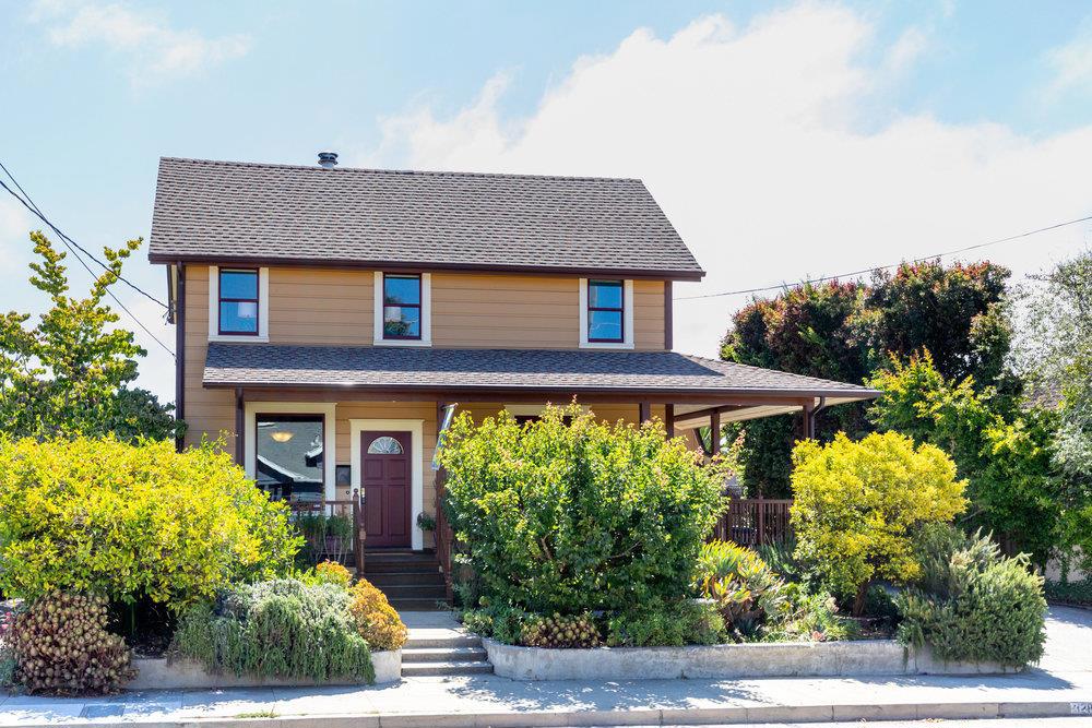 This is the home you've been waiting for, where the warmth of a turn-of-the-century country farmhouse meets the convenience of in-town living, in the heart of a well-established, sought-after Eastside neighborhood. Set on a lot just under 10K sq ft, the home offers a rare blend of space, charm, and lifestyle. It lists as 3BR, but the flexible floor plan with extra office, den, and family rooms can easily live as a 4 or 5BR, plus a generous attic perfect for hobbies or children's hideaway. The deep, drive-through garage is ideal for projects, while the backyard feels like an urban farm. A true gardeners delight overflowing with veggies and flowers thriving in rich organic soil, towering sunflowers, birds and butterflies. To complete this backyard haven, a chicken coop, kid's clubhouse and a stand of redwoods waiting for a hammock. Generous wraparound, front porch, high ceilings, and wood details are a nod to the homes history, while quality double pane windows, extensive structural and electrical upgrading, and a remodeled kitchen make for easy living. The location puts you a short stroll or bike ride to Whole Foods, Shoppers Corner, Tacos Moreno, Friday Midtown and favorite shops - proof you can have the feel of country living and the best of Santa Cruz, right at your doorstep