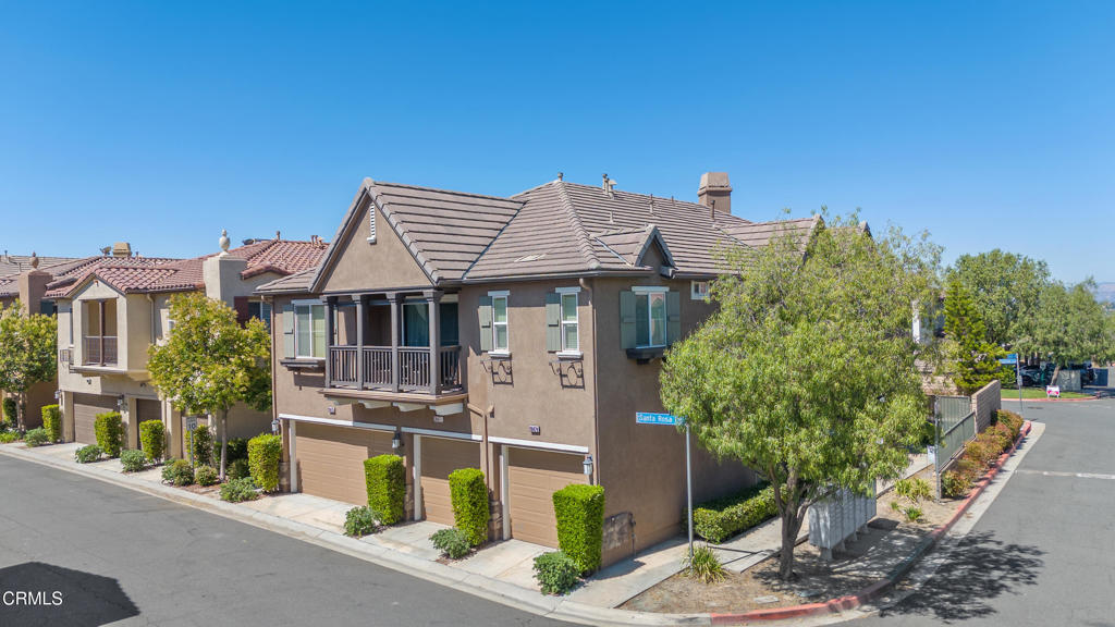 Charming Two-Story Townhome! Welcome to this beautiful townhome offering 1,440 square feet of spacious living in a family-friendly Mariposa community. This bright and airy home features an open layout, an inviting kitchen, with stainless steel appliances and dining room. Enjoy relaxing in the open living room with direct access to your own private backyard which is perfect for morning coffee, entertaining, or gardening. Upstairs, you'll find two generously sized bedrooms with plenty of closet space each with their own full bathrooms. Additional features include 2 parking spaces: an attached one-car garage, a covered carport space, in-unit laundry, and central A/C. The community offers resort-style amenities including a Clubhouse, sparkling pool, spa, a playground, dog park and well-kept landscaped grounds. Conveniently located near shopping, dining, parks, and great schools. All appliances included, move-in ready and waiting for you to call it home!