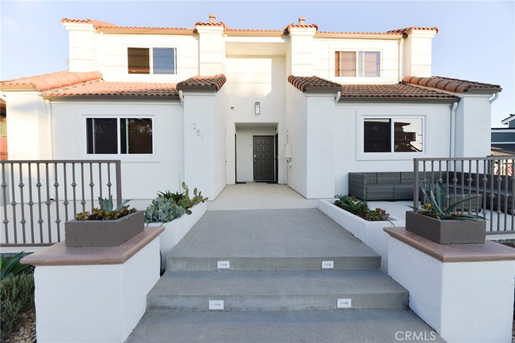 Location! Location! Coastal Breezes! Fantastic opportunity to live in Central San Clemente! This delightfully upgraded lower level TWO bedroom ONE Bath unit with TWO decks and private TWO car garage is centrally located west of the 5 frwy between the San Clemente pier and famous T-Street beach! This light and bright unit boasts a stunning custom kitchen complete with white shaker cabinets, gorgeous quartz counters, detailed backsplash, stainless steel sink & hardware, recessed lighting. Lighted ceiling fans adorn all rooms in the unit including the kitchen. Wall color is a neutral warm white showcasing the custom hard flooring and baseboards. Enjoy exclusive use of a large private front deck (right side) as well as an additional large rear deck overlooking the canyon. Additional amenities include FULL SIZE washer & dryer inside unit, refrigerator, dishwasher, built in microwave....and don't forget the private TWO CAR GARAGE! Walking distance to Downtown San Clemente restaurants and shopping, San Clemente pier and beach trails and T-street Beach! LOVE WHERE YOU LIVE!